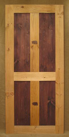Rustic door with bear carving