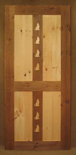 pine door with wolf carving