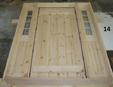Exterior stockade door with 4 lite sidelights