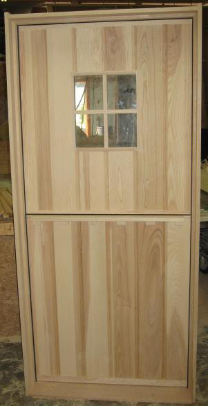 Hardwood stockade door with 4 lite window