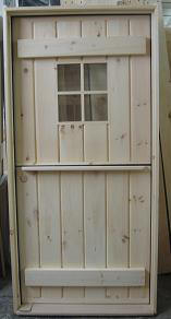 Stockade dutch door with shelf and 4 lte window