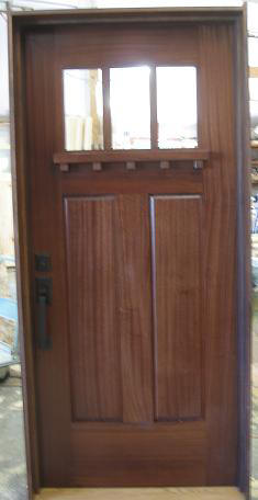 finished mahogany mission style door with shelf