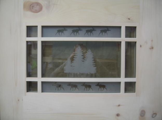 Tree and moose etched glass door
