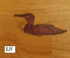 Carving of a loon